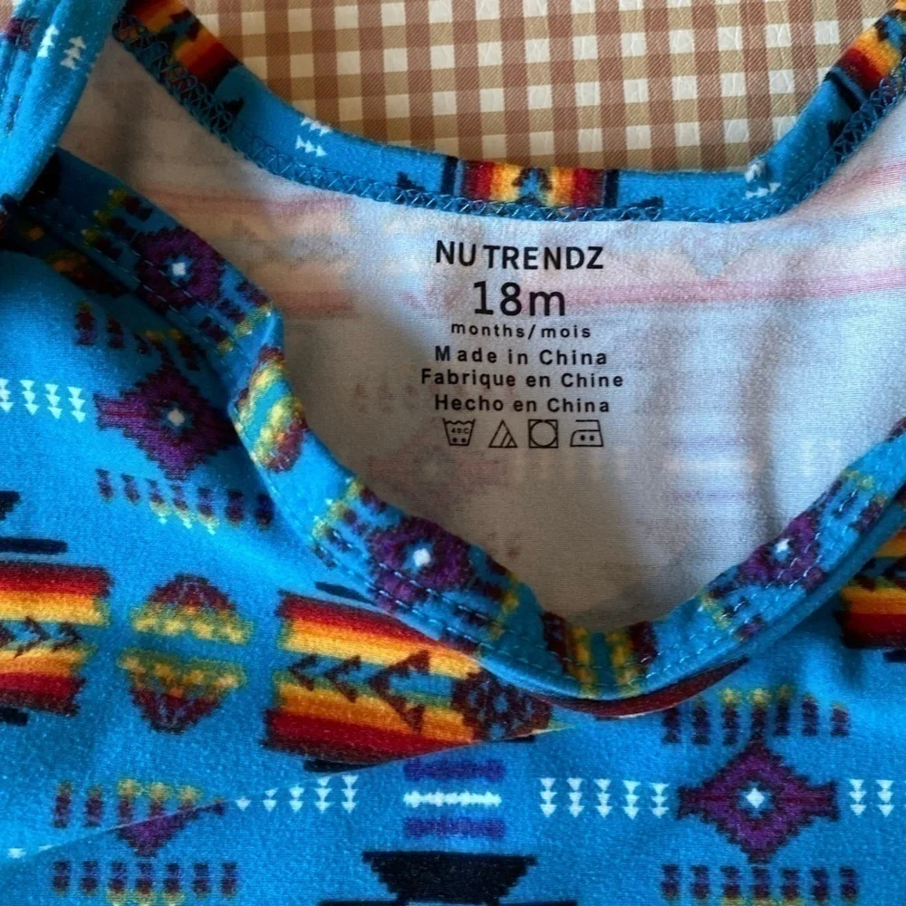 Tribal print‎ stretchy onesie. Size 18 Months